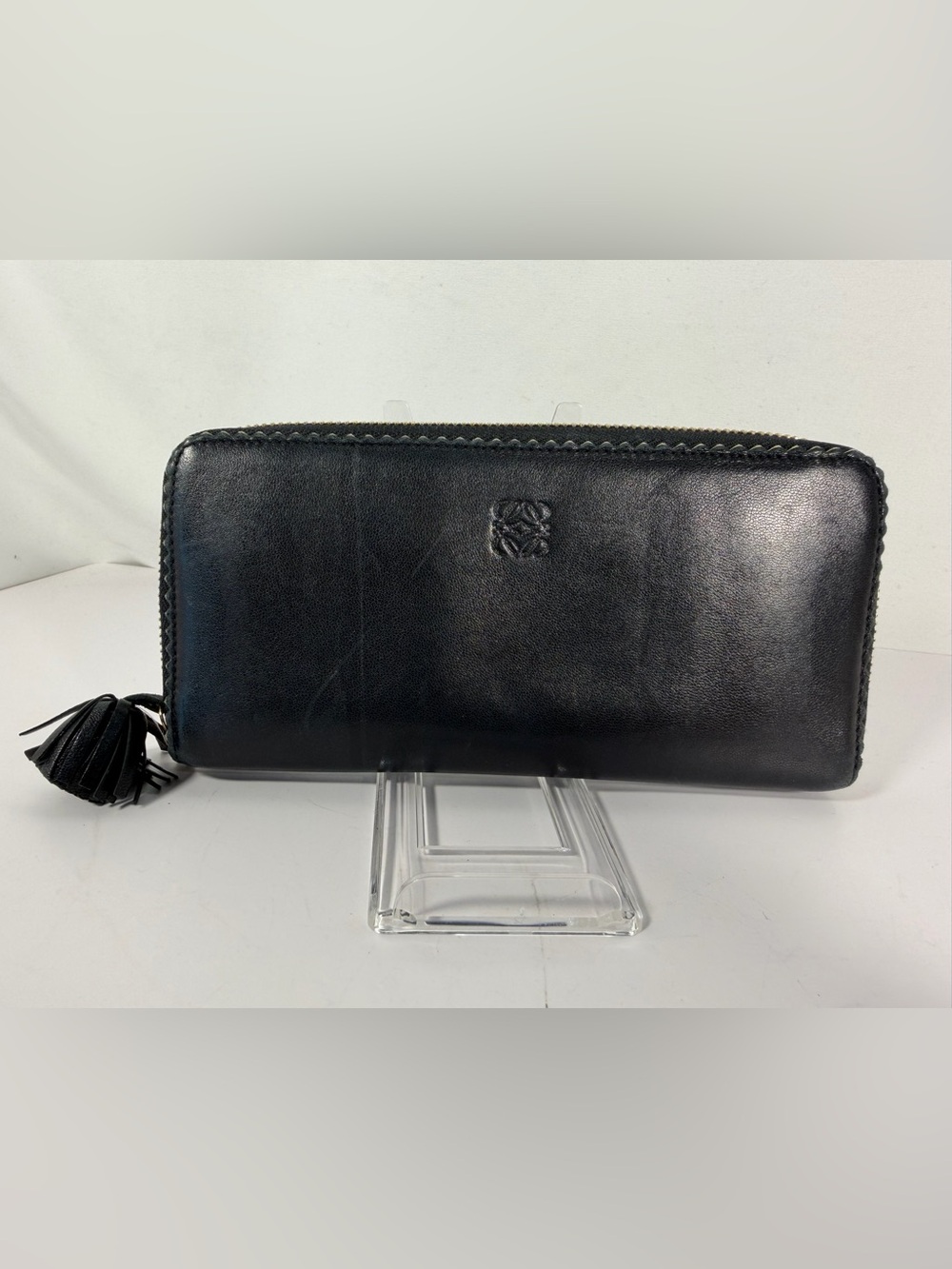 1290: Loewe Anagram Black Leather Zip Around Wallet Purple Interior Tassel